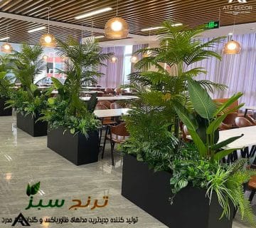 استفاده از فلاور باکس در داخل مجتمع تجاری برای جدا کردن رستوران و کافی شاپ در لابی و ووید مجتمع تجاری