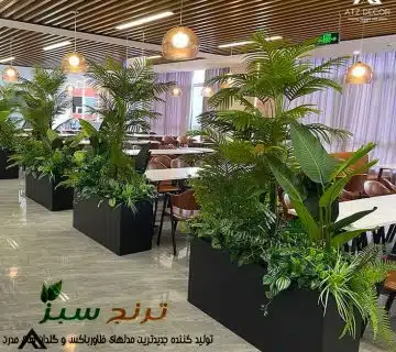 استفاده از فلاور باکس در داخل مجتمع تجاری برای جدا کردن رستوران و کافی شاپ در لابی و ووید مجتمع تجاری